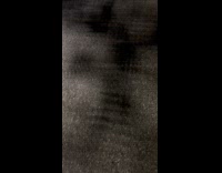 Man sees low resolution shadow of tree 