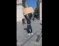 Denim jacket guy cardboard sign free hugs