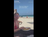 Girl eats food at beach work out