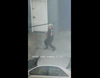 Man black shirt face mask brown paper bag tiktok dance sidewalk Part 3