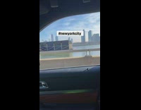 Santa Claus stands and waves on Cargo ship in New york