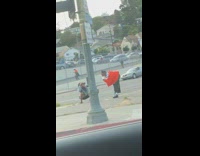 Red jacket girl black pants water bottle 