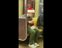 Girl does voiceover for guy eating sandwich on subway train