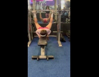 Woman lifting weights with legs