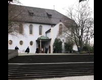Group priest black robe dance stairs church