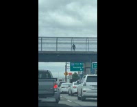 Collab WINY - Man hoodie dance on footbridge over highway