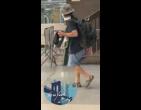 Guy wears white mask at penn station 