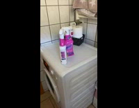 Spray bottles move because of washing machine vibrations