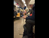 Man doing crunches on subway handrail