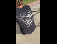 Guy tricked bee on shirt