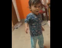 Young boy imitate his uncle coughing sound