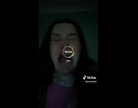 Woman using face filter mid sneeze 