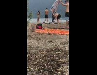 Woman black bikini brown dress beach photoshoot