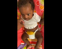 Baby with poop overflow from the diaper