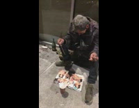 Black jacket guy looks at nsfw magazine 