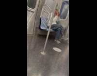 Guy wraps duct tape around mouth on train 