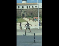 Man black shirt dance plaza stone wall