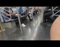 Man shoots and play with a toy gun inside the train