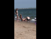 Girl blue bikini sit pose beach kids