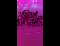 Backwards Merry Christmas text decoration on wall