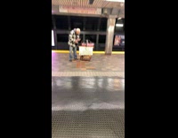 Guy american flags donations appreciated subway station