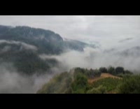 Time lapse of clouds on mountain valley part 2