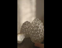 Diamond egg shaped vase reflects sunlight