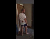 Girl throws bread onto guy sticks