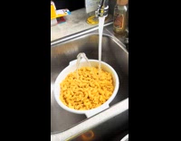 Water going through macaroni noodle