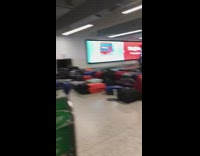 Collab DailyDoseOfInternet - Suitcases fall off crowded baggage carousel airport 
