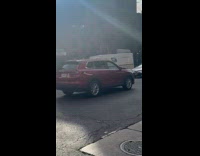 Man on wheelchair causes traffic on street