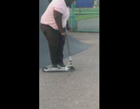 Collab BitchIG2 - Guy in pink shirt on scooter goes down ramp and lands his trick