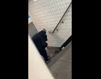 Collab Subway Creatures - Man sharpens knife on the subway stairs