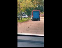 Amazon driver throws package at house yard