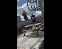 Girl black dress stand table leg tattoo