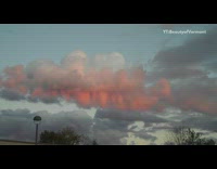 Pink white grey clouds sunset blue sky