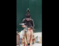 Pigeon birds sit with lady 