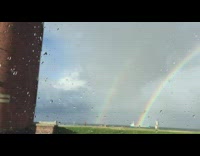 Double rainbow blue ship boat car window 