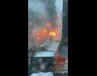 Girl looks out window and sees fire 