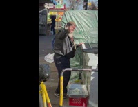 Guy plays keyboard on sidewalk