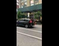 Black car seen with vomit of one of the passengers 