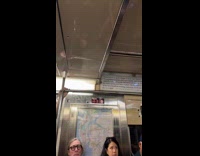 No Trump sign sticker placed inside train