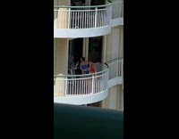 Two girls red blue bikini dance balcony