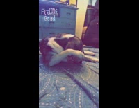 Dog tries to take blue sunglasses off 