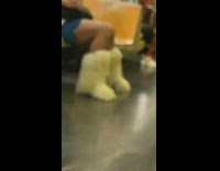 Guy wears furry uggs in train 