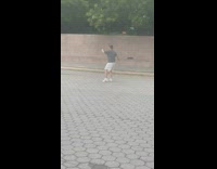 Grey shirt white shorts guy large sword 