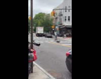 Man ride bike drag appliance on road