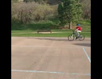 Kid rides bicycle hits metal pole fail 