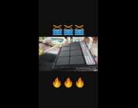 Guy bangs on electric drum pad with drumsticks 