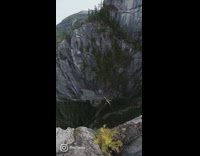 Man Runs and Jumps Off Between Two Cliffs 